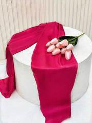 Satin silk inner from Rosé Bloom Set in deep rose pink, displayed with tulip flowers, highlighting its soft and luxurious texture.